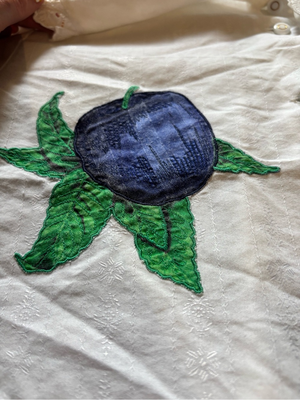 White Short-Sleeve Button-Up Top with Blue Floral Applique - Picture 4 of 6